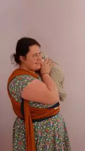 Portage à bras poupon